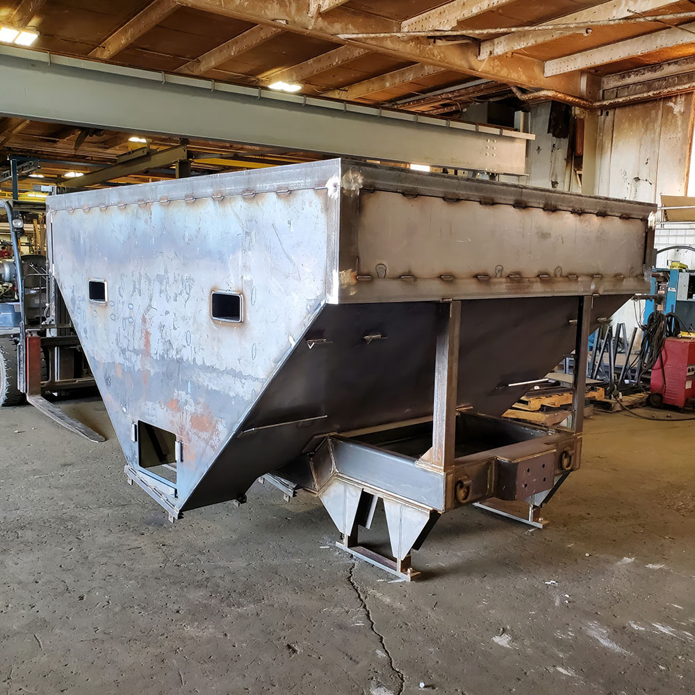 Large welded metal container in Last Arrow factory