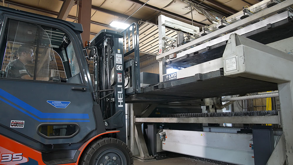 Forklift delivers sheet metal