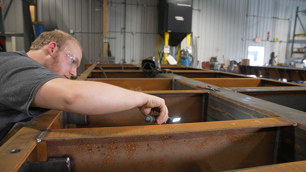 Inspecting welds on large metal structure