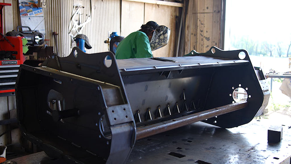 Welder welding a large metal structure